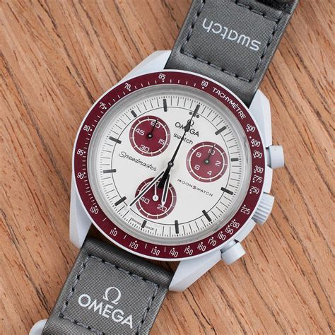 omega swatch pluto price.